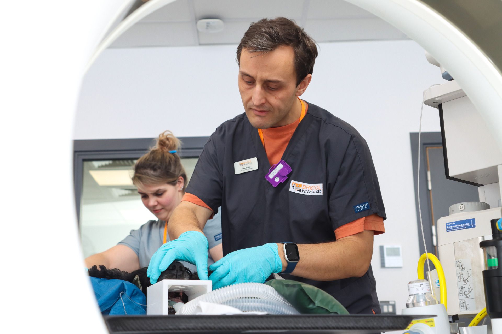 Dr. Davies performing a pre-radiotherapy CT Simulation on a canine patient